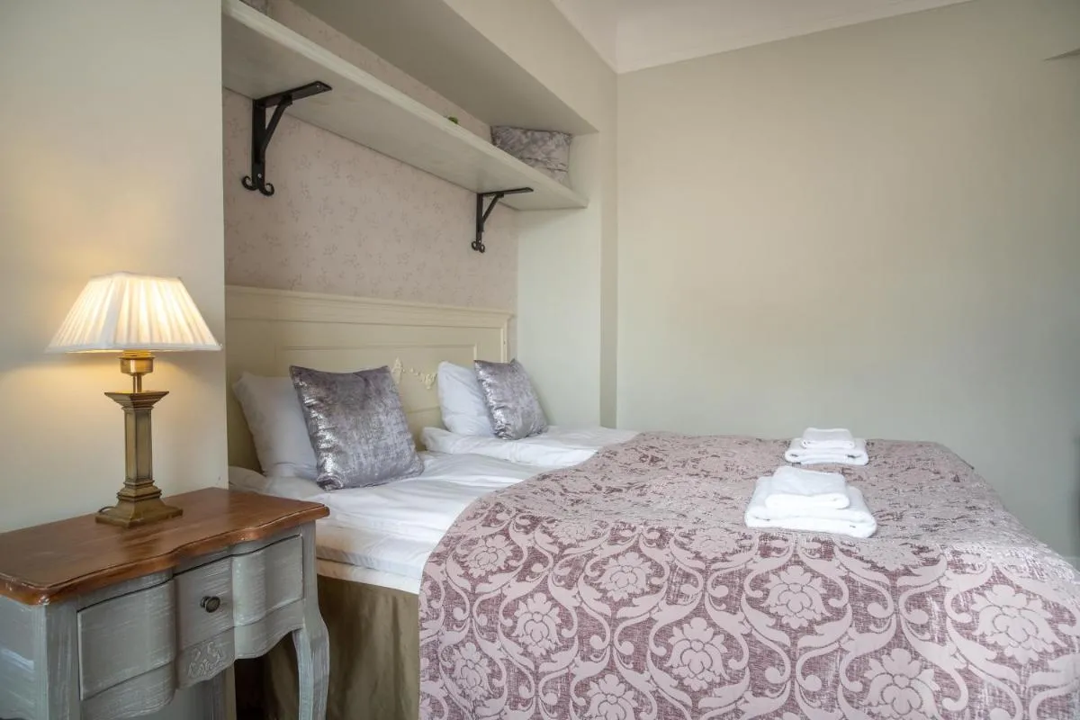 Image 6 of Dream Stay – Historical 3-Bedroom Apartment with Sauna & Fireplace