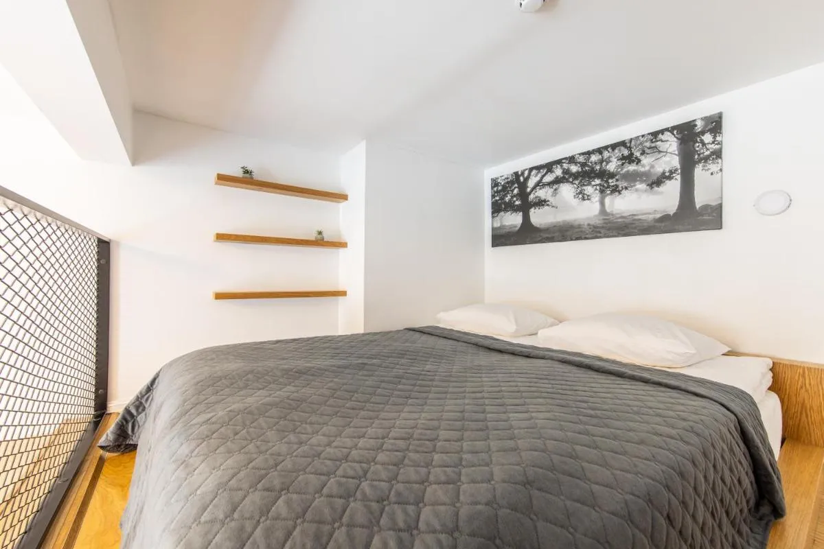 Image 1 of Urban Two-Level Apartments 13